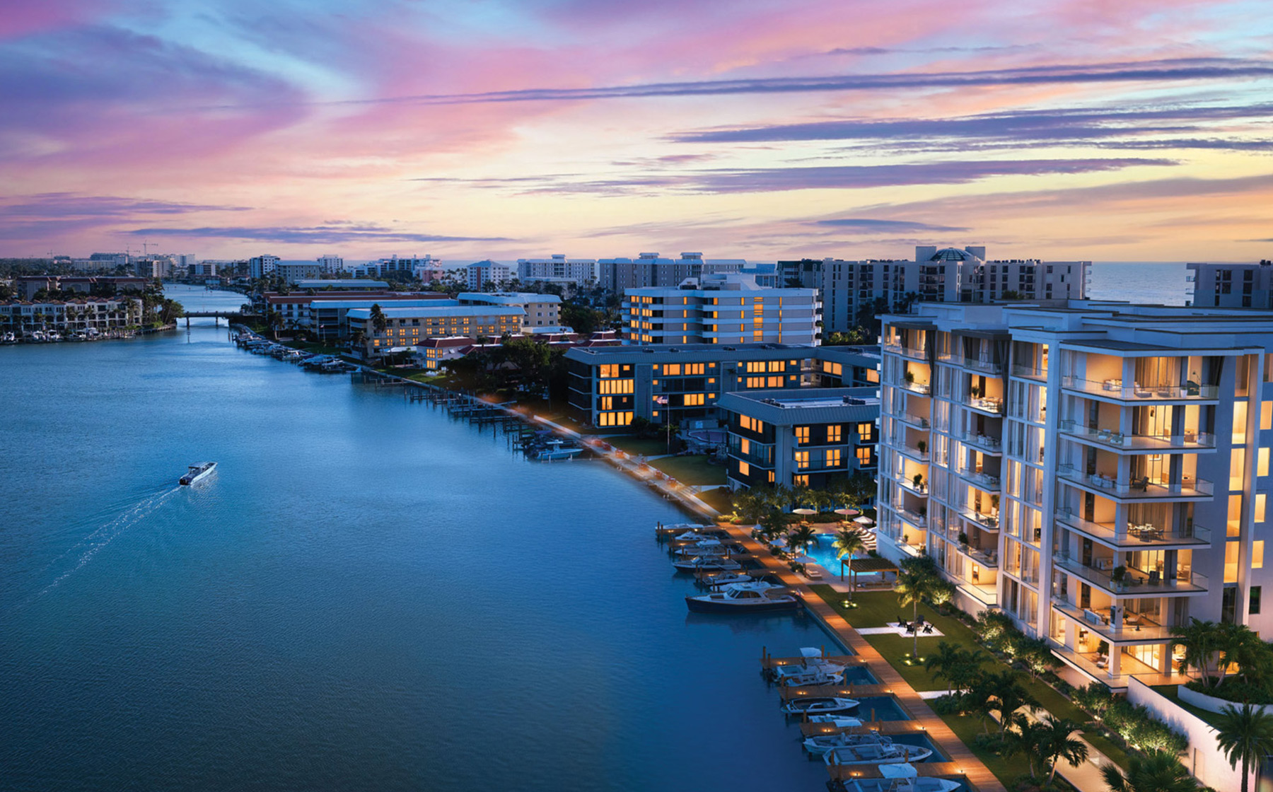 Bayfront pool deck and private marina at 3300 Gulf Shore Naples